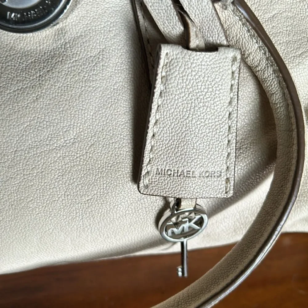 Michael Kors handbag silver lock and keys tan color impeccable